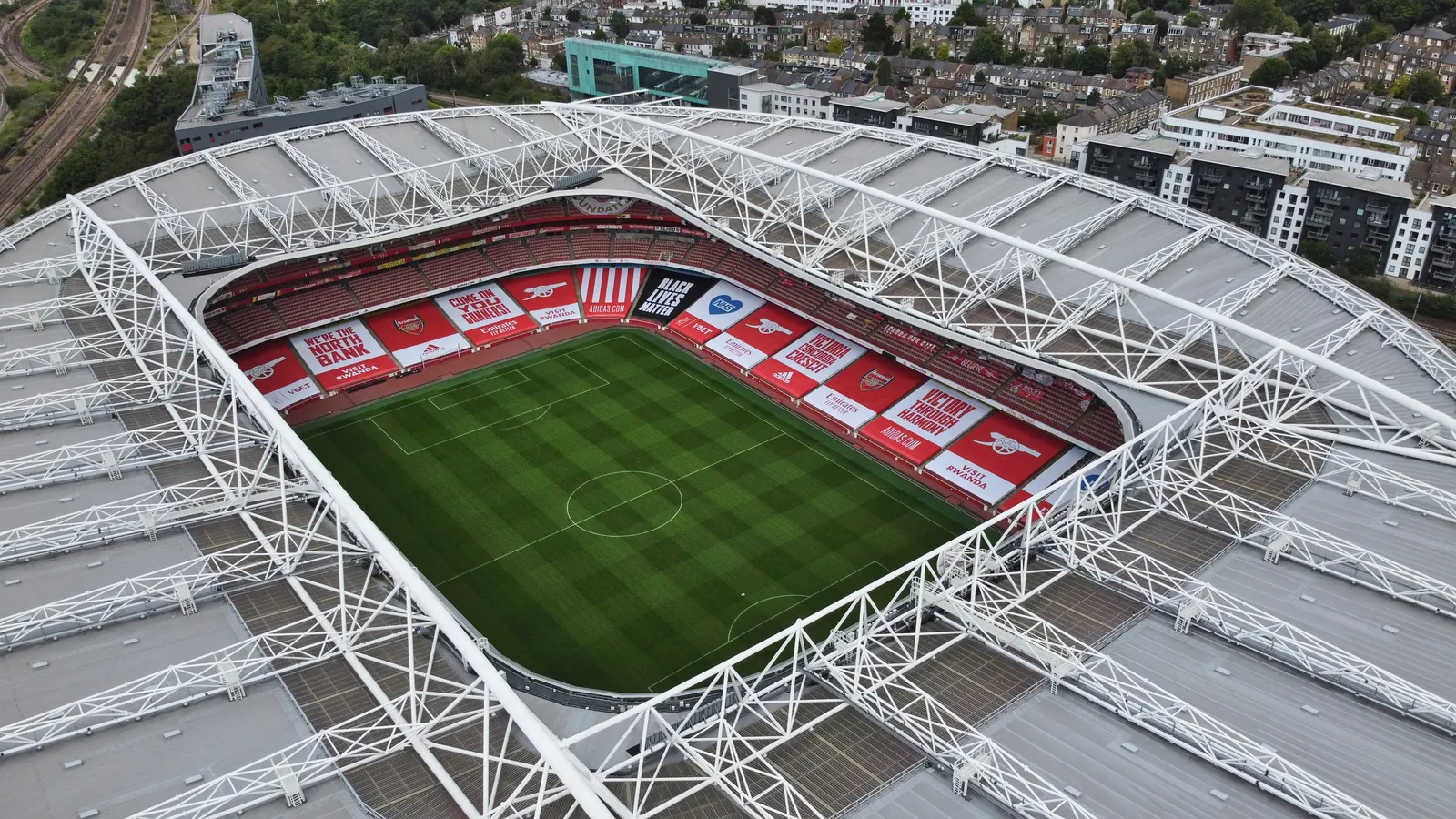 The Emirates Stadium and surrounding north London streets, viewed from above.