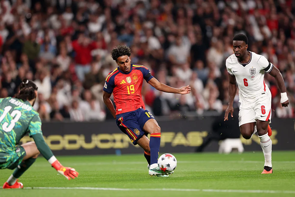 Spain and England players during a match.